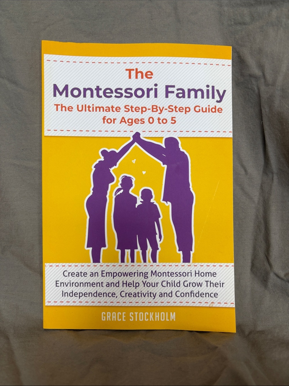 Amazon Yellow and Purple "The Montessori Family" Book